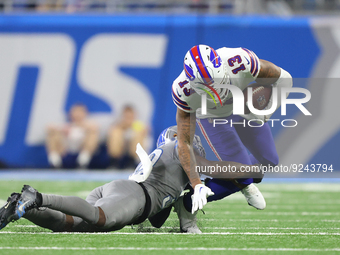 Buffalo Bills wide receiver Gabe Davis (13) is tackled by Detroit Lions cornerback Jerry Jacobs (39) during the second half of an NFL footba...