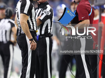 Referee Clete Blakeman (34) review a play during the second half of an NFL football game between the Detroit Lions and the Buffalo Bills in...