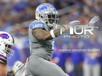 Detroit Lions linebacker Austin Bryant (2) celebrates after a play during the second half of an NFL football game between the Detroit Lions...