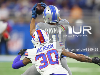 Detroit Lions wide receiver Kalif Raymond (11) catches a pass during the first half of an NFL football game between the Detroit Lions and th...