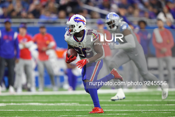 Buffalo Bills running back Devin Singletary (26) runs the ball during the first half of an NFL football game between the Detroit Lions and t...