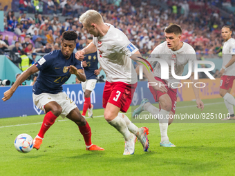 Kingsley Coman , Victor Nelsson , Joakim Maehle  during the World Cup match between France vs Denmark, in Doha, Qatar, on November 26, 2022....