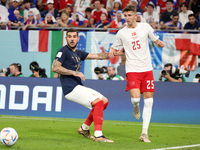 Theo Hernandez of France, Jesper Lindstrom of Denmark during the FIFA World Cup 2022, Group D football match between France and Denmark on N...