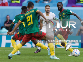 Martin Hongla (CMR), Jean-Charles Castelletto (CMR), Dusan Tadic (SRB), Nicolas Nkoulou (CMR) during the World Cup match between Cameroon vs...