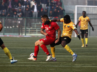 Midfielder Tana (L) of Churchill Brothers FC in action during the match between Real Kashmir FC and Churchill Brothers FC  in Srinagar,Kashm...