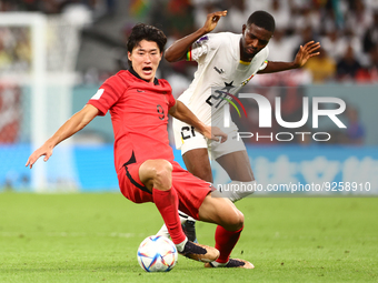 Guesung Cho (KOR), Salis Abdul Samed (GHA) during the World Cup match between Korea Republic v Ghana , in Doha, Qatar, on November 27, 2022....