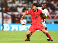 Guesung Cho (KOR), Salis Abdul Samed (GHA) during the World Cup match between Korea Republic v Ghana , in Doha, Qatar, on November 27, 2022....