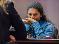 Koneru Humpy (right) of India ponders her next move against Anna Ushenina (left) of Ukraine during a rapid chess match (women's section) at...