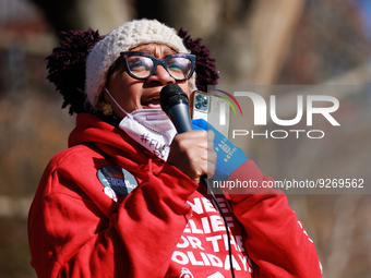 A demonstrator speaks outside of the White House in Washington, D.C. on World AIDS Day, December 1, 2022 during a protest hosted by The Myal...