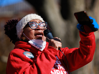 A demonstrator speaks outside of the White House in Washington, D.C. on World AIDS Day, December 1, 2022 during a protest hosted by The Myal...