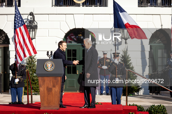 President Joe Biden and President Emmanuel Macron of France shake hands during the arrival ceremony for a state visit, the first for the Bid...