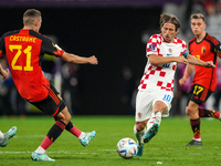 (21) CASTAGNE Timothy of team Belgium battle for ball with (10) MODRIC Luka of team Croatia during the FIFA World Cup Qatar 2022 Group F mat...