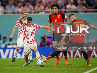 (19) DENDONCKER Leander of team Belgium battle for ball with (9) KRAMARIC Andrej of team Croatia during the FIFA World Cup Qatar 2022 Group...
