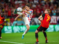 (7) DE BRUYNE Kevin of team Belgium battle for ball with (10) MODRIC Luka of team Croatia during the FIFA World Cup Qatar 2022 Group F match...