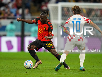 (25) DOKU Jeremy of team Belgium battle for ball with (10) MODRIC Luka of team Croatia during the FIFA World Cup Qatar 2022 Group F match be...