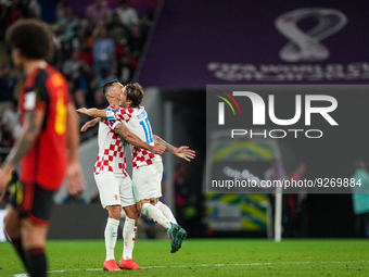 (6) Dejan Lovren and (10) Luka Modric of team Croatia celebrate after won the match and qualify to round 16 at the FIFA World Cup Qatar 2022...