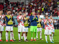 Team Croatia celebrate after won the match and qualify to round 16 at the FIFA World Cup Qatar 2022 Group F match between Croatia and Belgiu...
