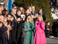 Brigitte Macron (center left) and Jill Biden applaud during the official arrival ceremony for French President and Mrs. Macron for a state v...
