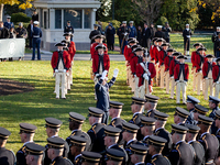 The US Army Old Guard Fife and Drum Corps and other ceremonial military units await the official arrival of President Emmanuel Macron and Mr...