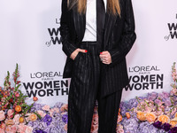 Australian actress Katherine Langford arrives at the L'Oreal Paris' Women Of Worth Celebration 2022 held at The Ebell of Los Angeles on Dece...