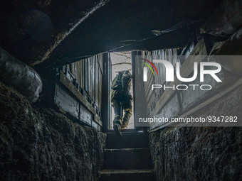 An ukrainian soldier returns to the frontline after taking a rest in his unit underground shelter in Zaporizhia region, Ukraine. (