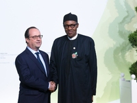 President Muhammadu Buhari (R) and French President Francois Hollande (L) arrival for the opening of the UN conference on climate change COP...