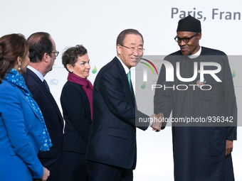 President Muhammadu Buhari (R) and Secretary-General of the United Nations Ban Ki-moon arrival for the opening of the UN conference on clima...