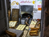 Traditional pita bread bakery at the Via Dolorosa in the Old Town in Jerusalem, Israel on December 27, 2022. (
