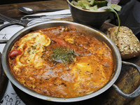 Shakshouka dish served in Israeli restaurant in Jerusalem, Israel on December 28, 2022. (