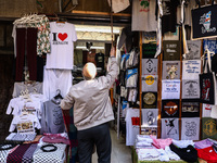 A stand with souvenir t-shirts in the Old City in Jerusalem, Israel on December 29, 2022. (