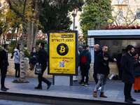 Bitcoin Change poster on a street in Jerusalem, Israel on December 29, 2022. (