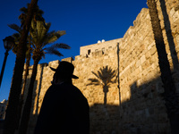 An orthodox Jew is seen walking in the Old City in Jerusalem, Israel on December 29, 2022. (