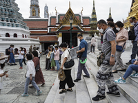 Tourists visit the Emerald Buddha Temple inside the Grand Palace in Bangkok, Thailand, 08 January 2023. Thailand is expected to welcome the...
