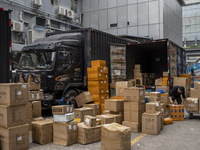 Boxes waiting to be loaded into a truck Huaqiangbei, a popular place to buy electronic goods on January 8, 2023 in Shenzhen, China. China to...