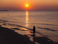 Charles Clore Beach during a sunset at the Mediterranean Sea in Tel Aviv, Israel on December 30, 2022. (