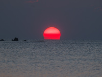 A sunset seen from Charles Clore Beach at the Mediterranean Sea in Tel Aviv, Israel on December 30, 2022. (