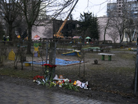 People leave Flowers and toys near kindergarten, the site of a helicopter crash in the Brovary town, in the outskirts of Kyiv, Ukraine, Janu...
