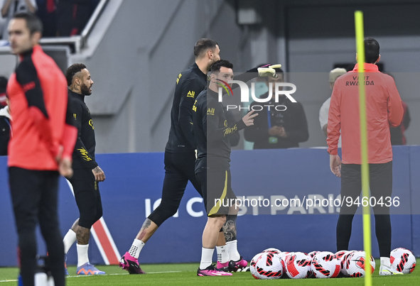 (L to R) Paris Saint-Germain's Neymar Jr, Gianluigi Donnarumma and Lionel Messi attend a team training session at Khalifa International Stad...