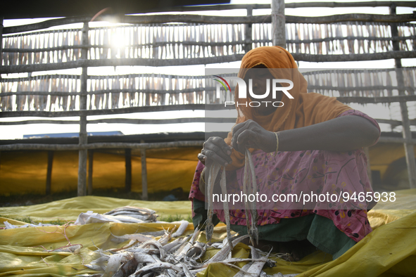 A worker during work at a dry fish factory in the Karnaphuli riverside area in Chittagong, Bangladesh on January 16, 2023.  