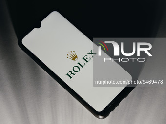 In this photo illustration a Rolex logo is displayed on a smartphone screen in Athens, Greece on January 20, 2023. (