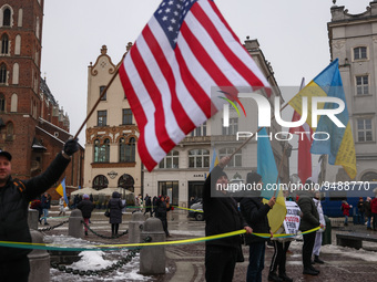 Ukrainian citizens and supporters attend a demonstration of solidarity with Ukraine at the Main Square, while celebrating Ukrainian Unity Da...