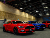 Ford Mustangs are seen during the MCM Car Show in Bogota, Colombia, the biggest auto show in latin america, on January 20, 2022. (