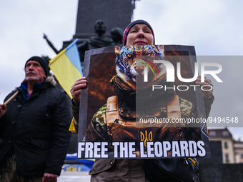 Ukrainian citizens and supporters attend a demonstration of solidarity with Ukraine at the Main Square on day 336 of Russian invasion on Ukr...