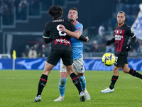 Sergej Milinkovic-Savic of SS Lazio and Sandro Tonali of AC Milan compete for the ball during the Serie A match between SS Lazio and AC Mila...