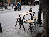 Empty tables of a restaurant due to low temperatures in Athens, Greece on January 25, 2023. (