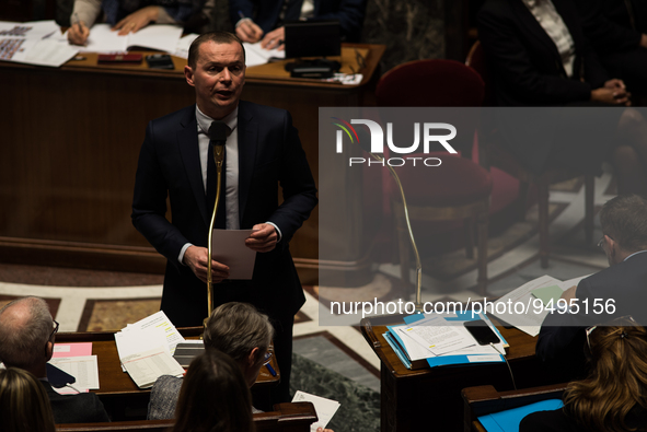 Labour Minister Olivier Dussopt speaks during the question session to the government, in Paris, Tuesday 24 January, 2023. 