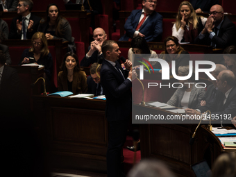 Labour Minister Olivier Dussopt speaks during the question session to the government, in Paris, Tuesday 24 January, 2023. (