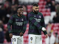 Vinicius Junior left winger of Real Madrid and Brazil and Karim Benzema centre-forward of Real Madrid and France  during the warm-up before...