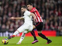 Nacho Fernandez centre-back of Real Madrid and Spain and Alex Berenguer right winger of Athletic Club and Spain compete for the ball during...