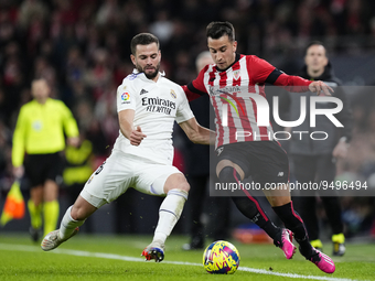 Alex Berenguer right winger of Athletic Club and Spain  and Nacho Fernandez centre-back of Real Madrid and Spain compete for the ball during...